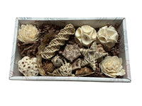 Box filled with various natural bird toys including vine, sola, loofah, palm